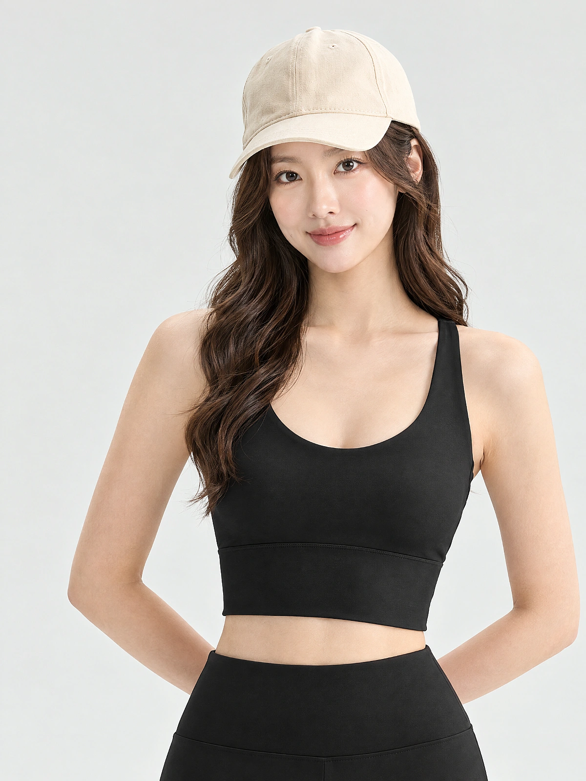 Black cross-back padded sports bra front view