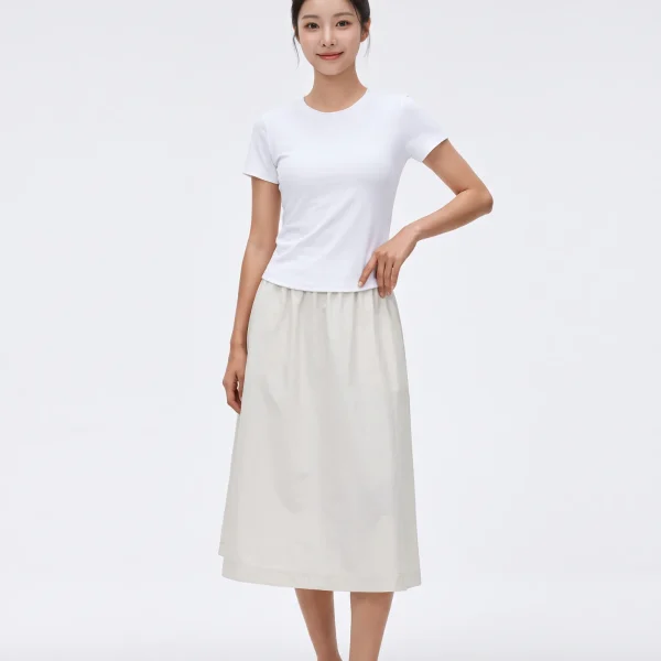 Light Ivory high-waisted A-line midi skirt styled with a white tee